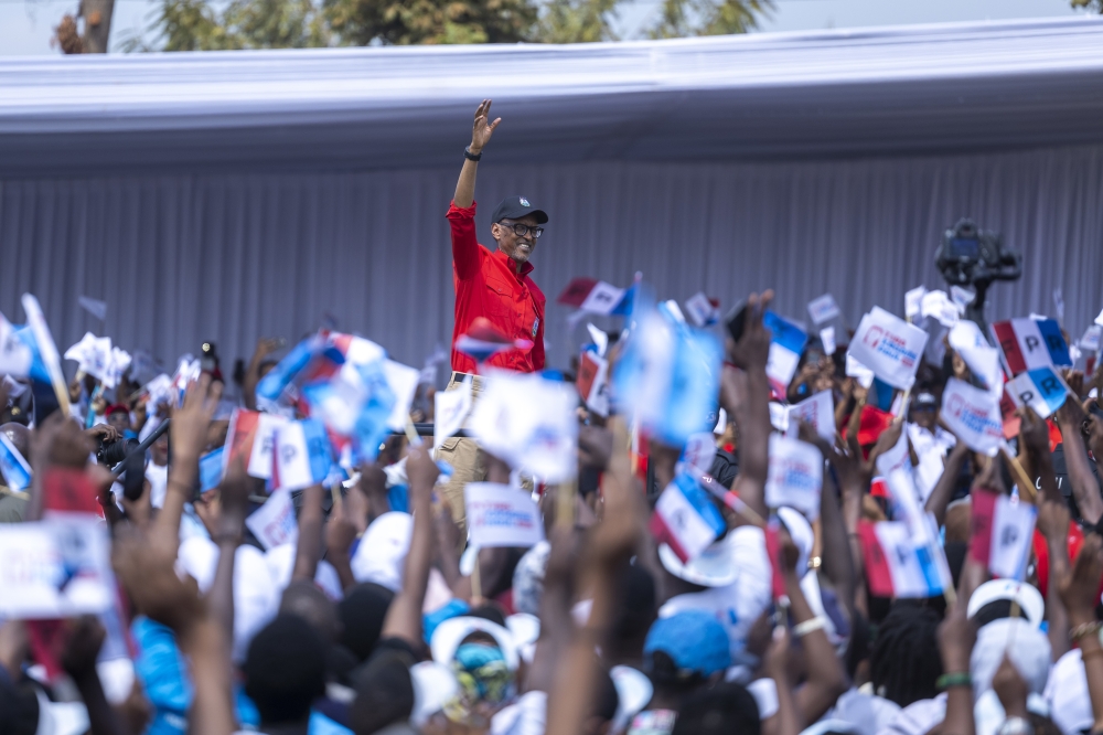 Paul Kagame, the Chairman and flagbearer of RPF-Inkotanyi greets thousands of residents in the presidential campaigns, in Nyarugenge on Tuesday, June 25. Photo by  Olivier Mugwiza