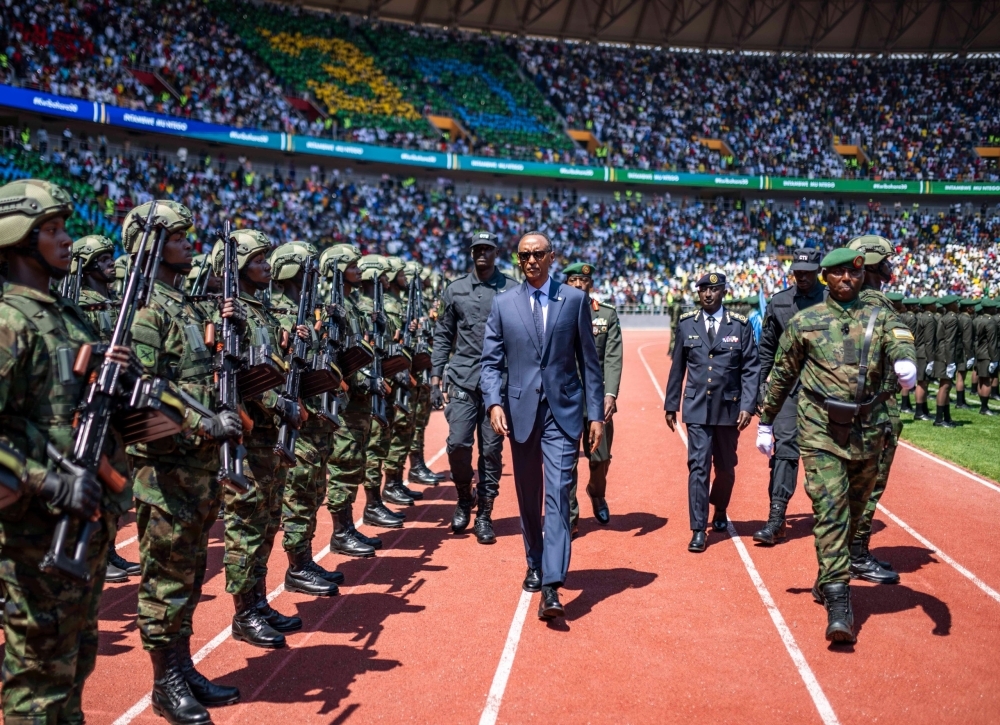 President Kagame, the Commander-In-Chief of the Rwanda Defence Force, inspects the military parade at Amahoro stadium during the 30 liberation ceremony at Amahoro stadium on July 4. Photo by Dan Gatsinzi
