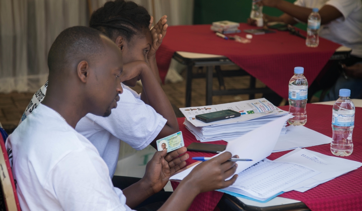 National Electoral Commission volunteers during the parliamentary election in 2018. The commission has this year  trained and deployed over 100,000 volunteers to help in the elections. Sam Ngendahimana