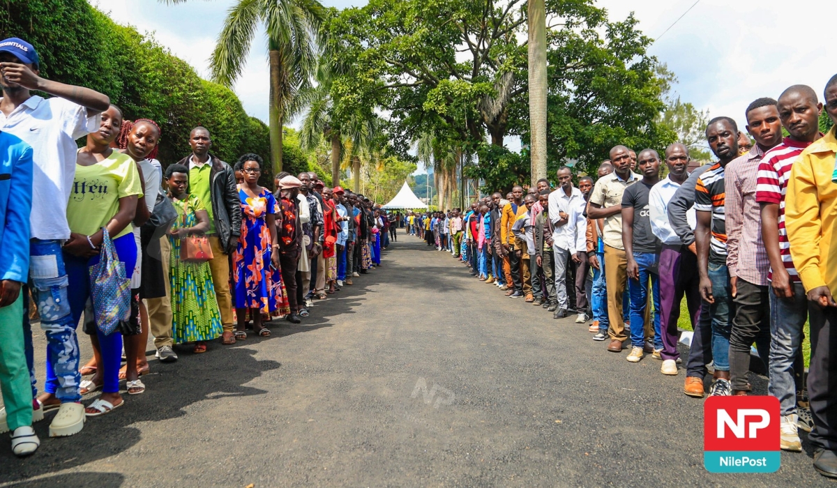 Rwandans queueing as they wait for casting their votes in Uganda duruing the presidential and parliamentary elections on Sunday, July 14. Photo by Francis Isano