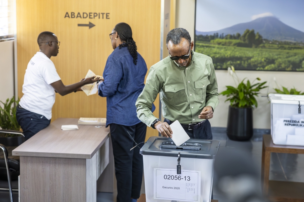 President Paul Kagame and First Lady Jeannette Kagame cast their ballots in the presidential and parliamentary elections at SOS Kagugu polling station in Kinyinya, Gasabo on Monday, July 15. Photo by Olivier Mugwiza