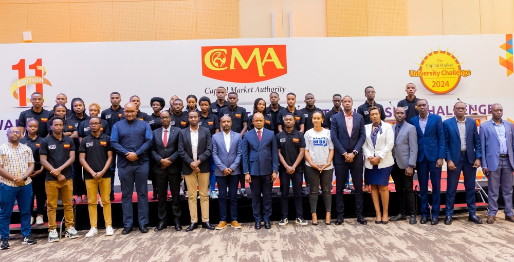 Officials and participants pose for a group photo at the awarding ceremony.