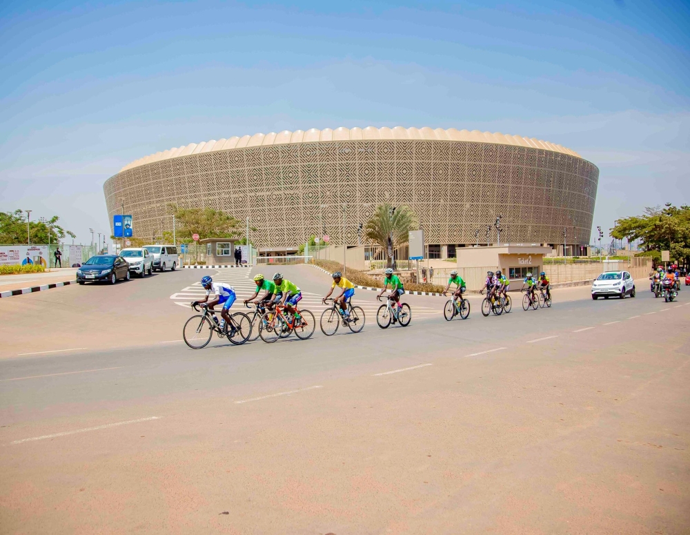 A group of riders in a breakaway near the newly revamped Amahoro Stadium  during the  Rwanda Junior Tour 2024 Cycling Championship. Ferwacy announced that Rwanda Championship will take place on 17-18 August.