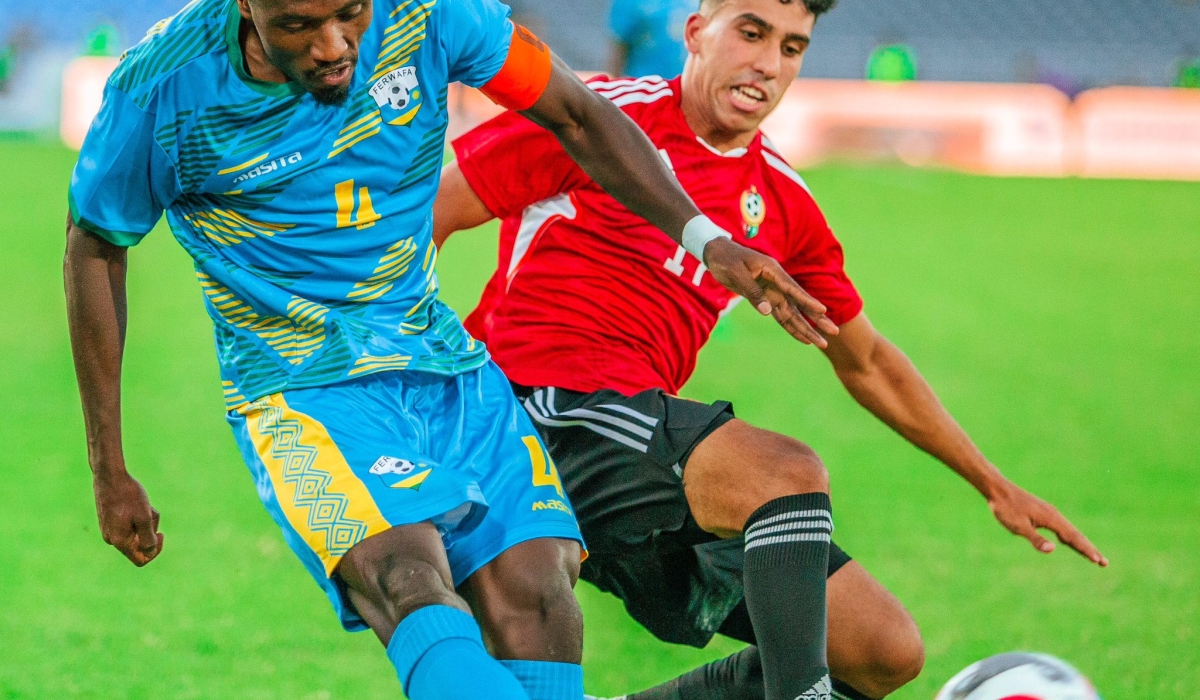Midfielder Djihad Bizimana in contention with a Libyan player during last week&#039;s 1-1 draw-courtesy