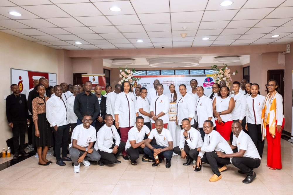 Staff and Management pose for a group photo. Staff and Management pose for a group photo.