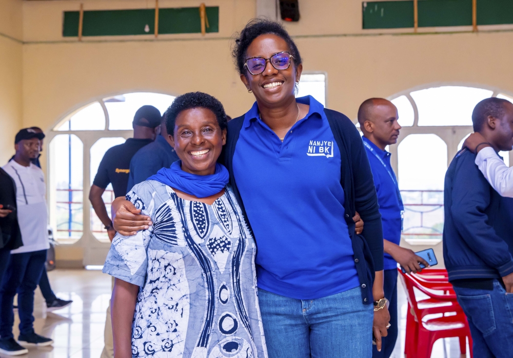 Bank of Kigali CEO Diane Karusisi poses for a photo with a customer as Bank of Kigali PLC concluded Customer Service Week on October 11. Courtesy