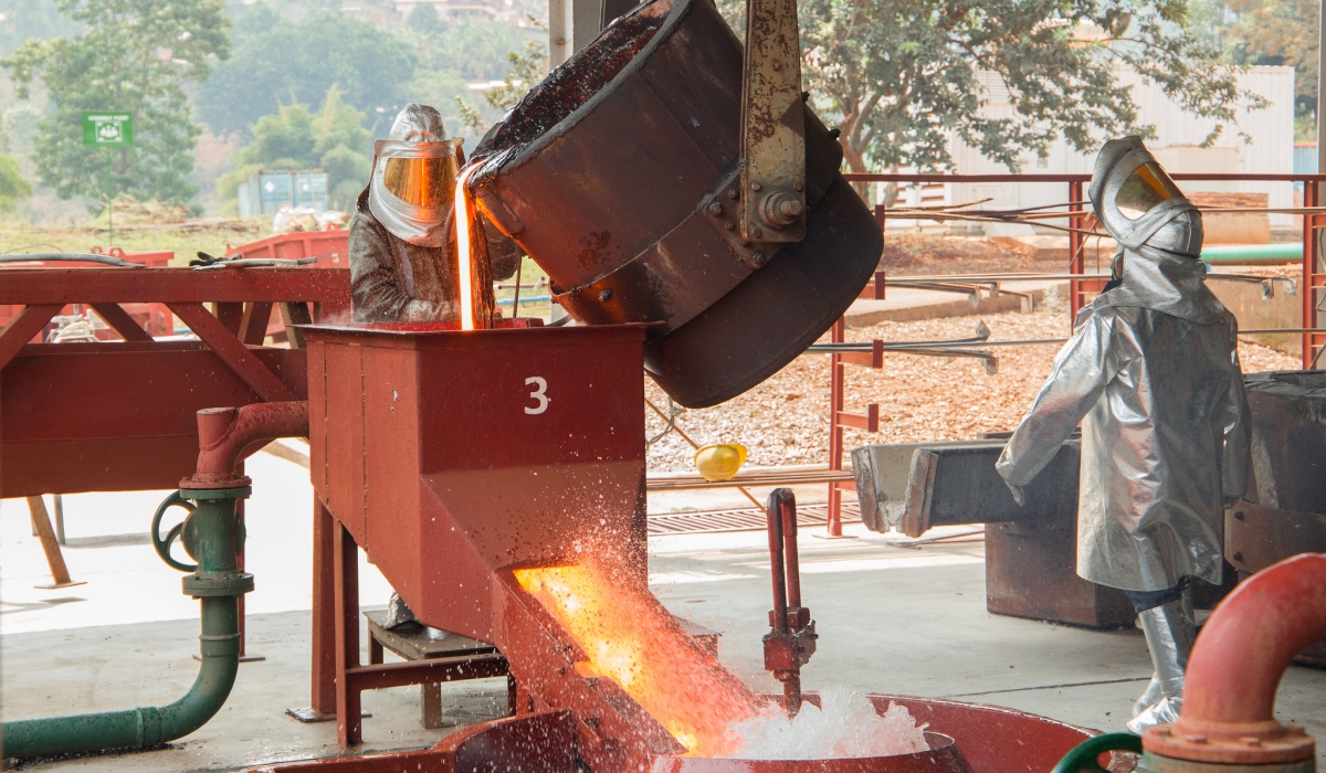 Workers melting tin at LuNa Smelter Ltd in Gasabo District. Photo by Sam Ngendahimana