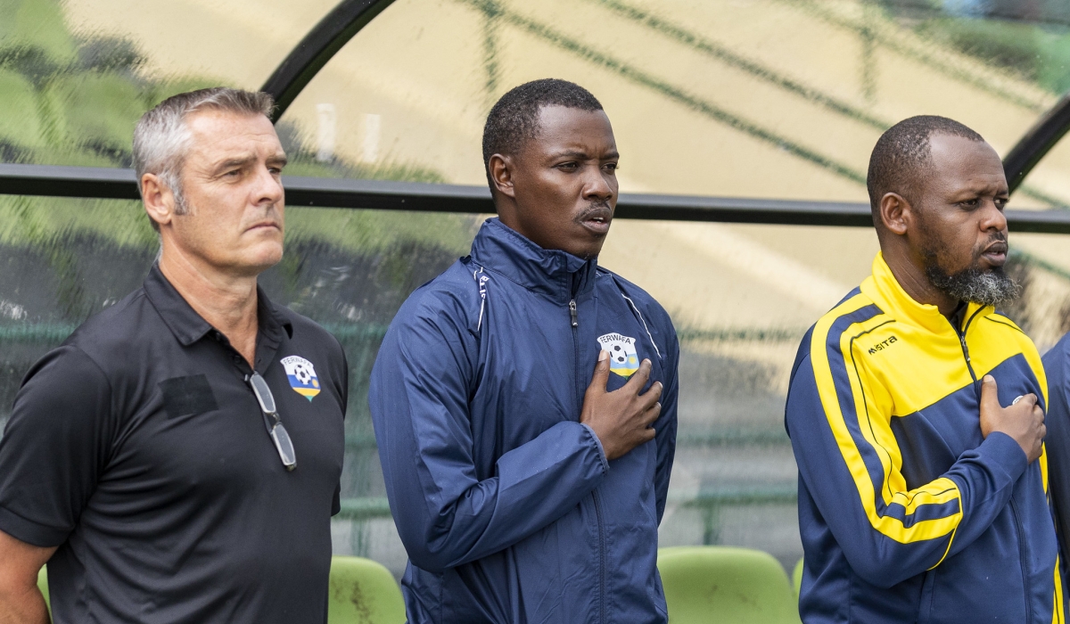 Amavubi head coach Frank Spittler (L) and assistant coaches Jimmy Mulisa and Yves Rwasamanzi during a game against Zimbabwe at Huye Stadium on November 15, 2023. Photo by Olivier Mugwiza