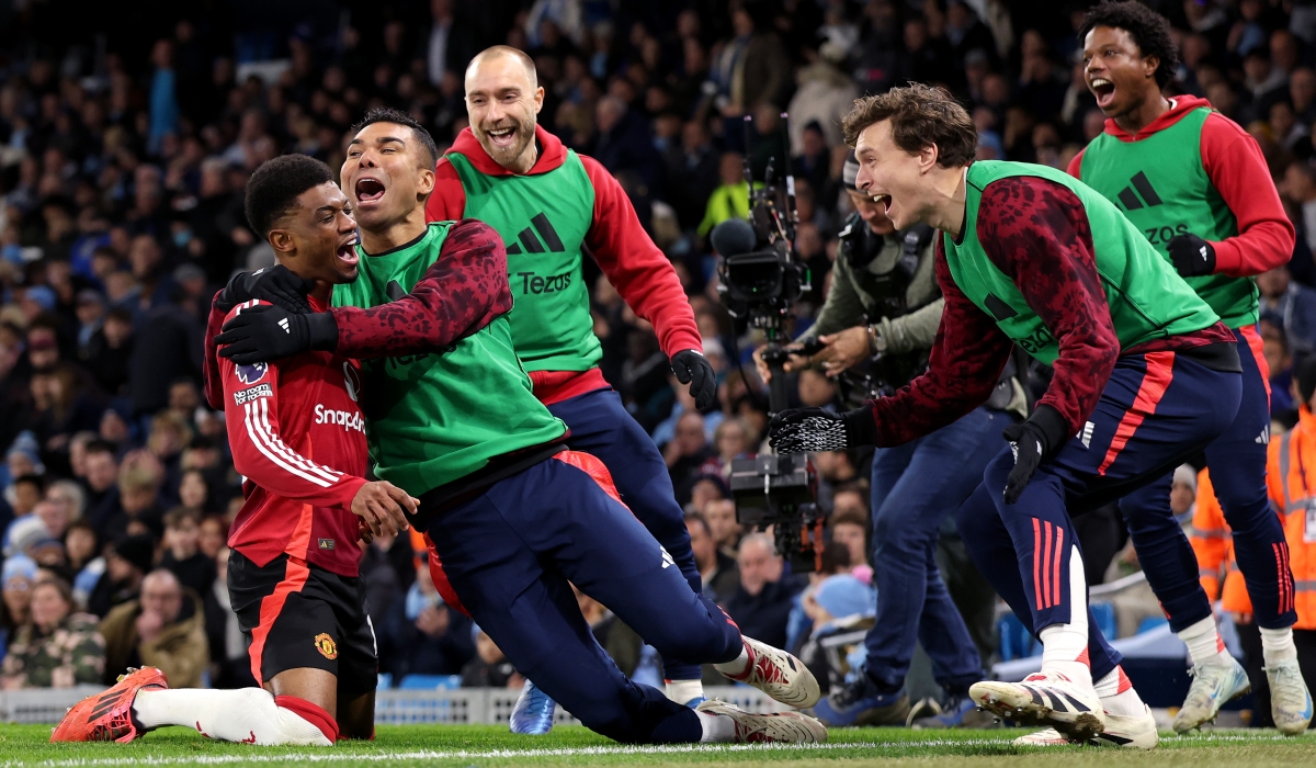 Man United bench joins Amad Diallo in celebration after scoring the winner in Sunday&#039;s 2-1 turnaround win against Manchester City at Etihad Syadium-Courtesy