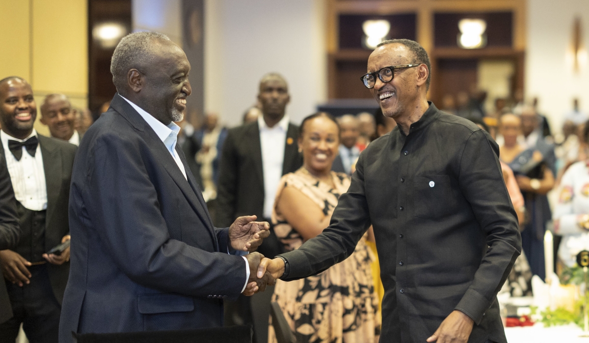 President Paul Kagame and Tito Rutaremara shake hands during the celebration of Rutaremara&#039;s 80th birthday on Saturday, November 23, 2024. Photo by Village Urugwiro
