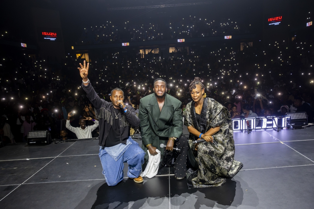 The Ben and MCs of the show Anita Pendo and Luckman Nzeyimana pose for a photo