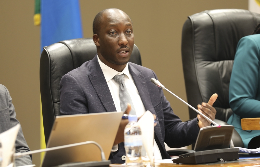Minister of Infrastructure, Jimmy Gasore, responds  to MPs’ queries on the decision to halt the registration of new petrol motorcycles for public transport in Kigali on Tuesday, January 7. Craish Bahizi