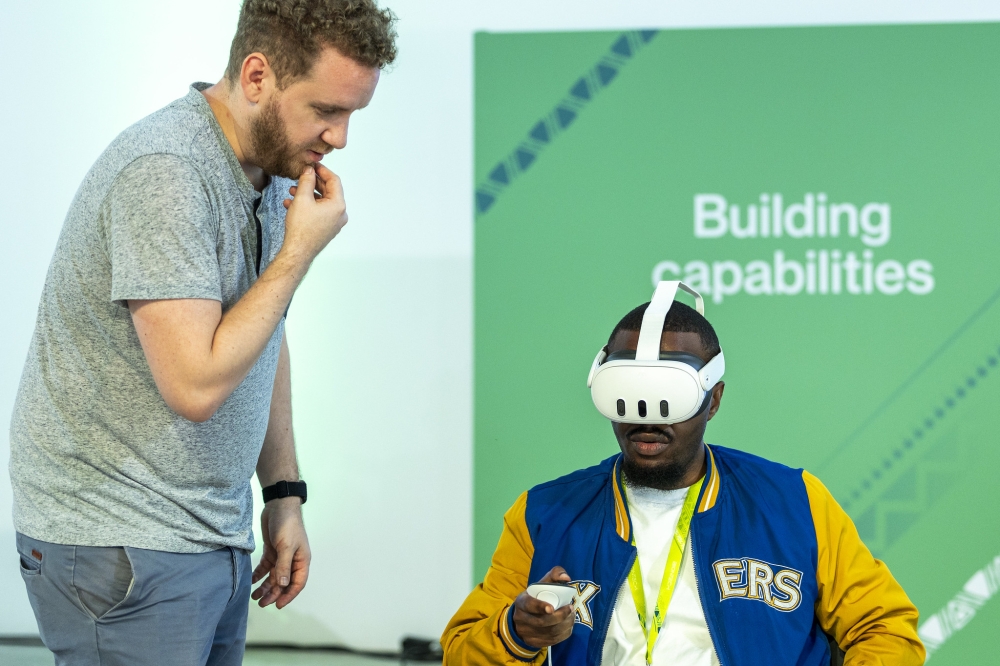 Delegates use Virtual Reality (VR) technologies at BioNtech firm in Kigali Special Economic Zone in December 2023. Augmented reality (AR) and Virtual Reality (VR) fall under the umbrella of extended reality(XR) technologies. Photo by Olivier Mugwiza