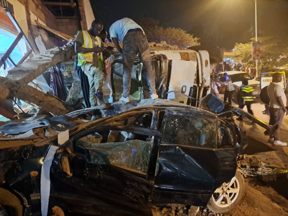 A scene of an accident where a speeding Fuso truck collided with a Toyota Carina E and a barbershop before coming to a stop at 7 p.m. on Wednesday, January 15, in Zindiro Village, Kinyaga Cell, Bumbogo Sector, Gasabo