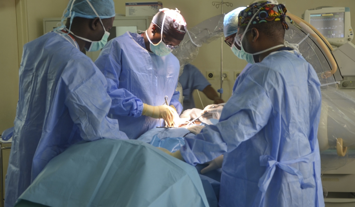 Doctors conduct an operation at King Faisal Hospital. Photo by Sam Ngendahimana