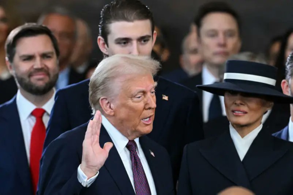 Donald Trump takes the oath of office during his inauguration as the 47th US president on Monday, January 20. Courtesy