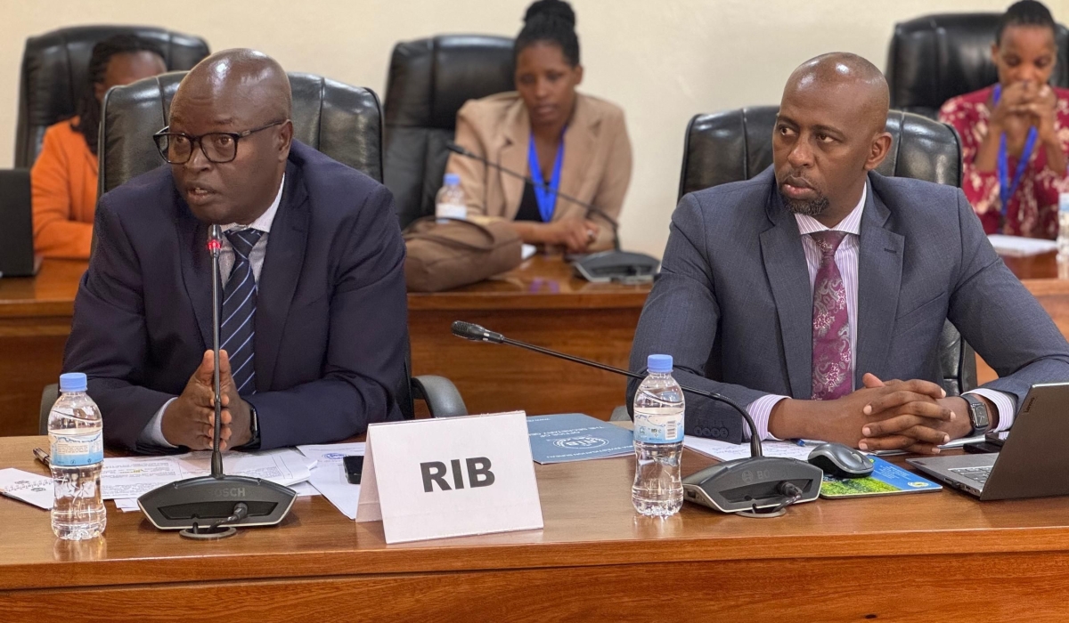 The Rwanda Investigation Bureau  Secretary General, Jeannot Ruhunga addresses members of Parliament on child detention, as RIB Spokesperson Thierry Murangira looks on, on Thursday, January 23. Emmanuel Ntirenganya