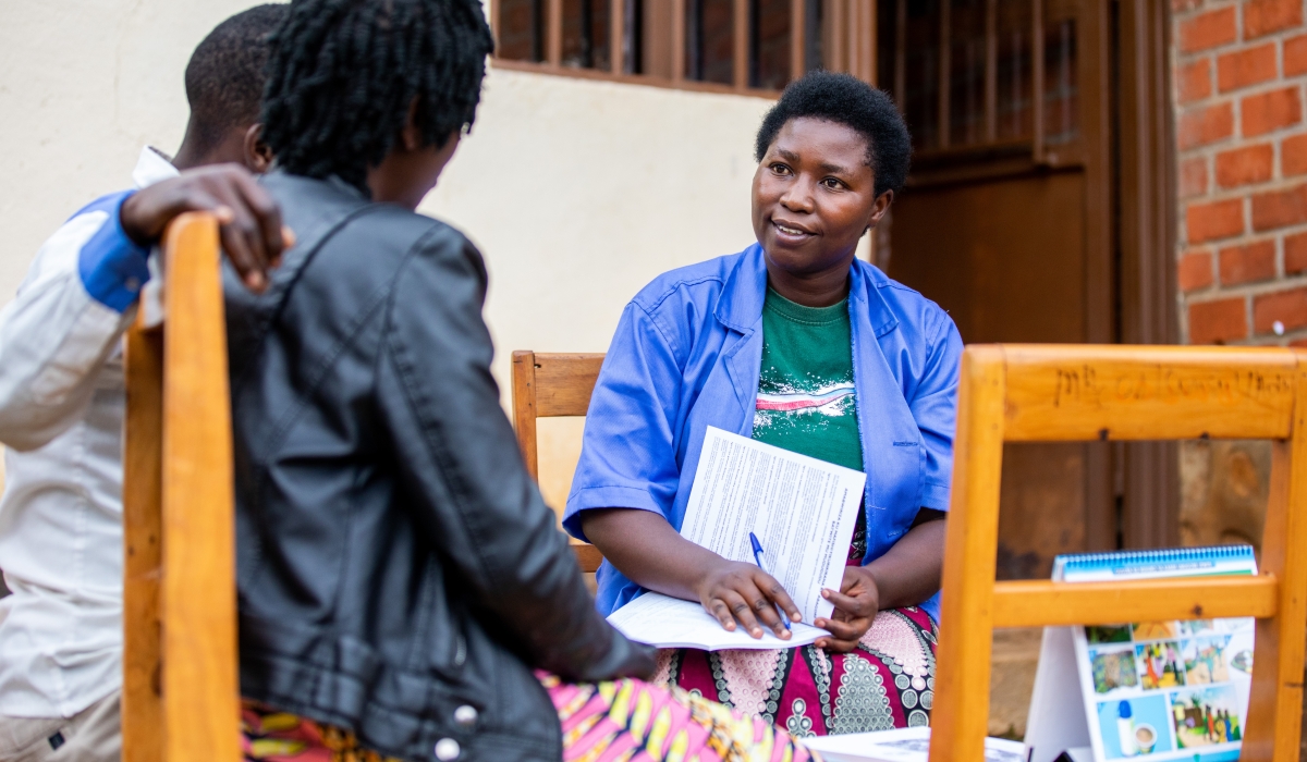 A Community Health Worker educates residents about malnutrition in Karongi District on December 9. Photos by Olivier Mugwiza