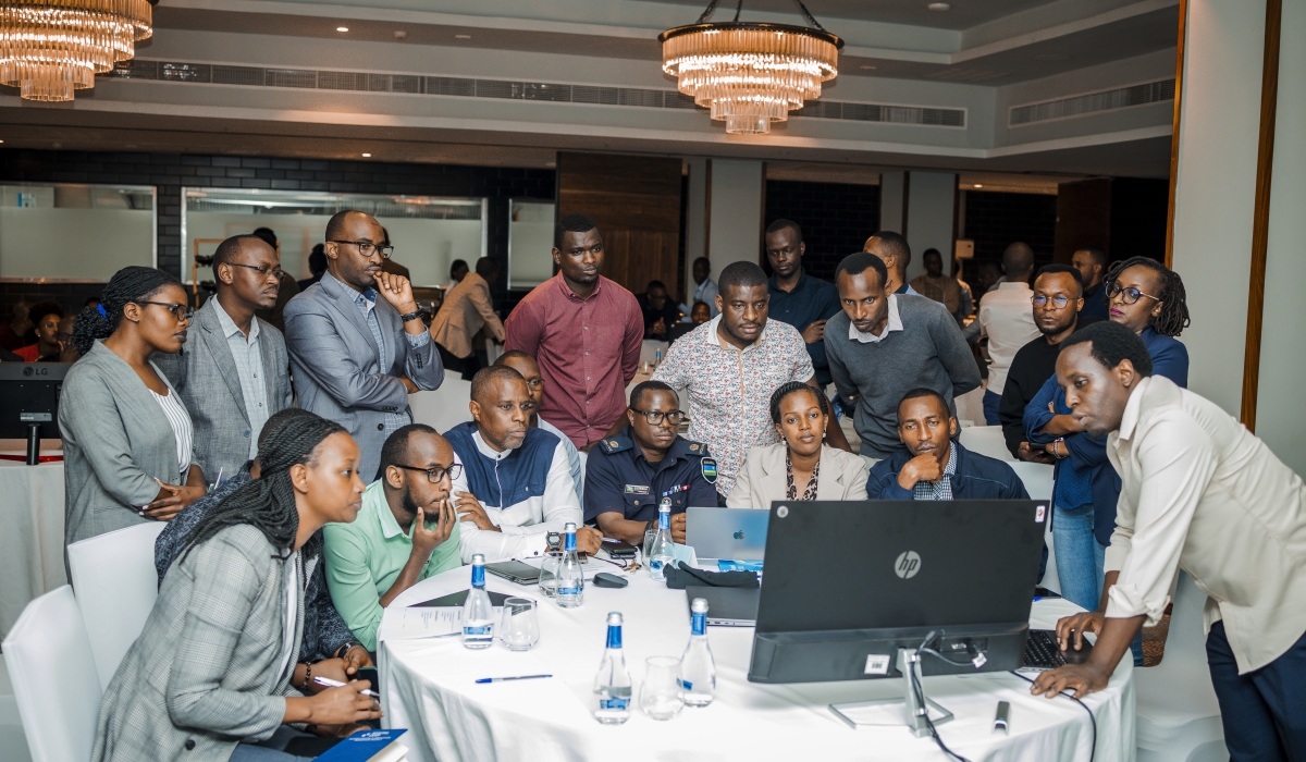 Irembo team and other officials engage in a workshop showcasing how existing services will be migrated to the new platform. Courtesy photos