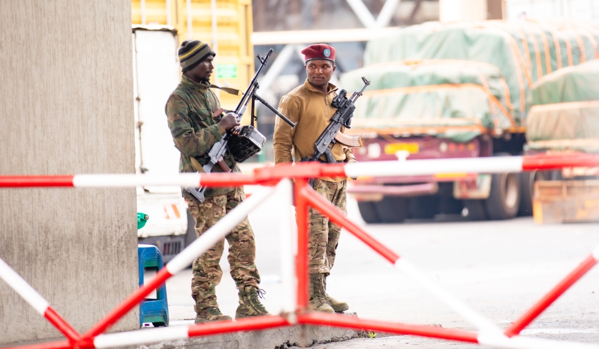 M23 fighters patrolling the border between Rwanda and DR Congo on January 29. PHOTO BY EMMANUEL DUSHIMIMANA