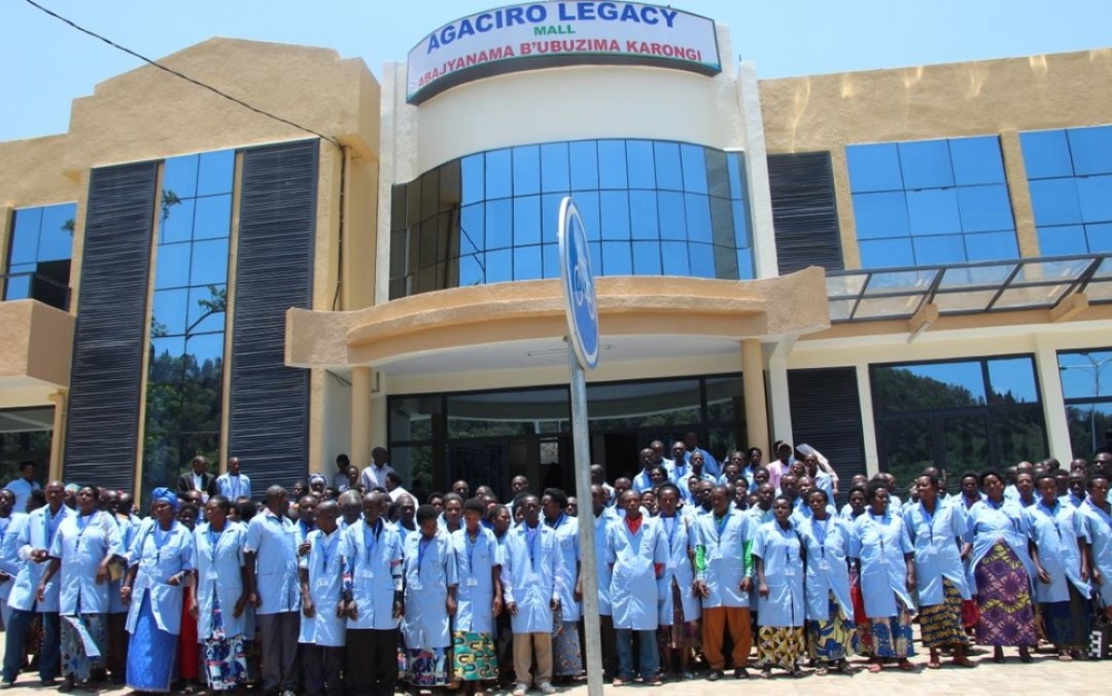 Community Health workers pose for a group photo by Agaciro Legacy Mall. Courtesy