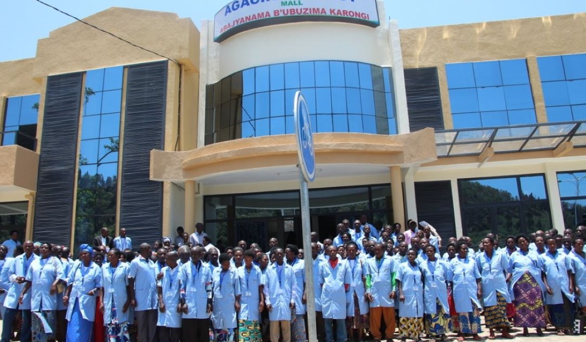 Community Health workers pose for a group photo by Agaciro Legacy Mall. Courtesy