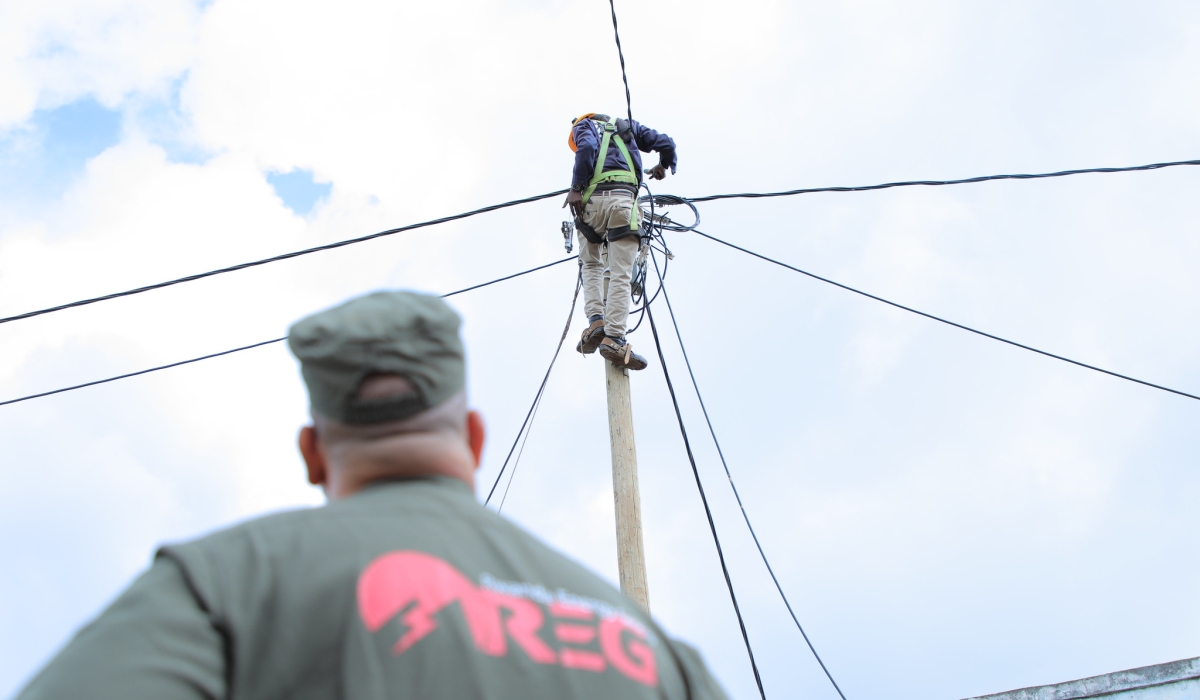 Rwanda Energy Group technician during electrical supply exercise in Gicumbi District. The initiative aims to provide electricity to 300 million Africans by 2030. File