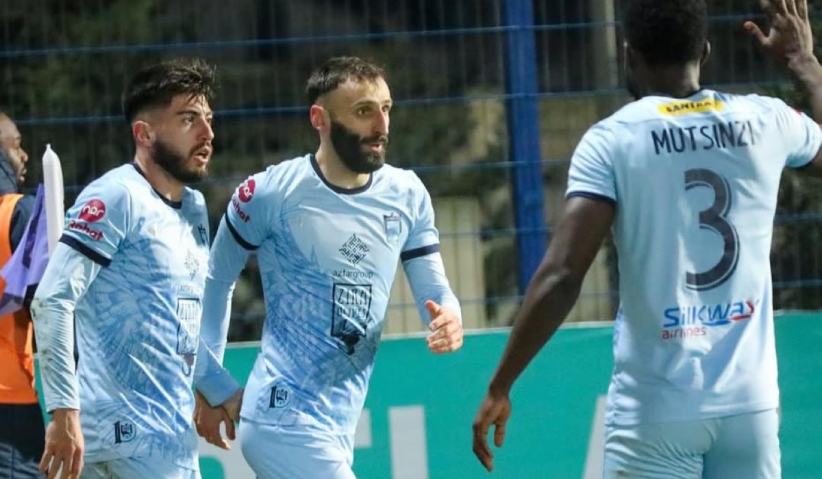 Defender Ange Mutsinzi joins his teammates in celebration after shocking Qarabag 3-2 to move third in the Azerbaijani top toer league-courtesy
