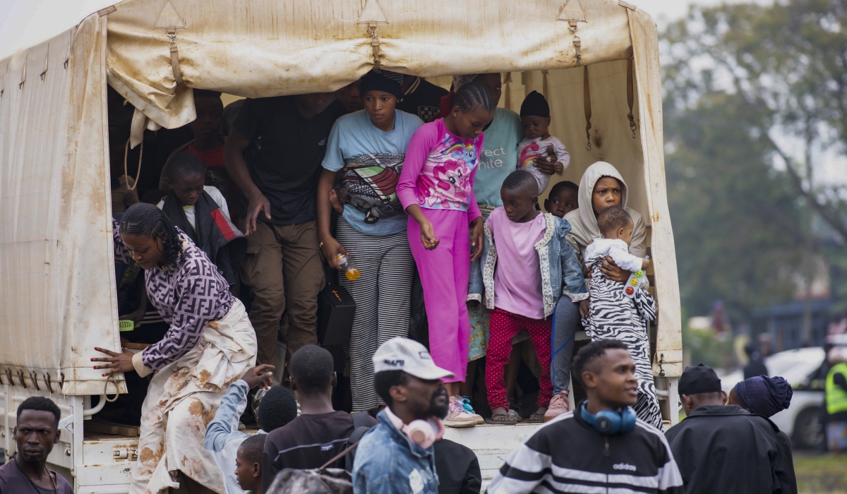 Refugees from Goma on their arrival in Rwanda on Monday on January 27. EAC, SADC Presidents have confirmed their  participation in DR Congo conflict talks to be held in Dar Es Salaam. Emmanuel Dushimimana