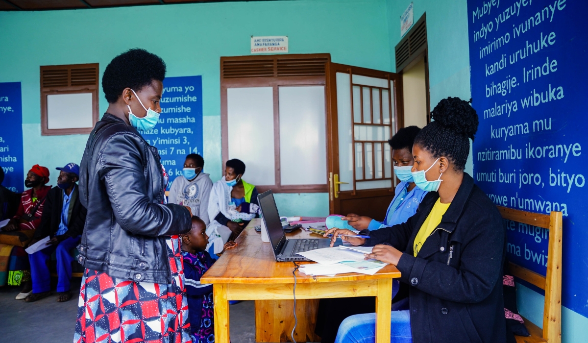 Health workers attend to the patients at Burera Health Post. The government is set to implement a new strategic plan  is to accelerate progress toward universal health coverage. Craish Bahizi