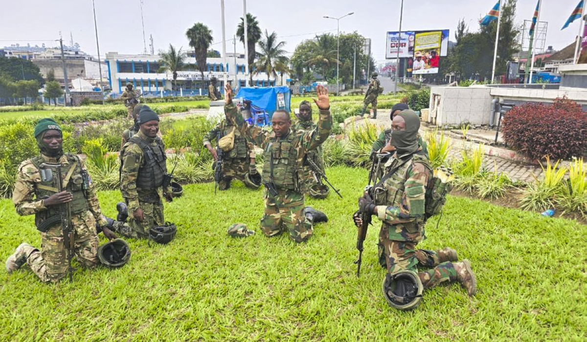 M23 rebels spokesperson Lt. Col. Willy Ngoma (center) and fighters celebrate after entering Goma City in eastern DR Congo on Tuesday, January 28. Courtesy