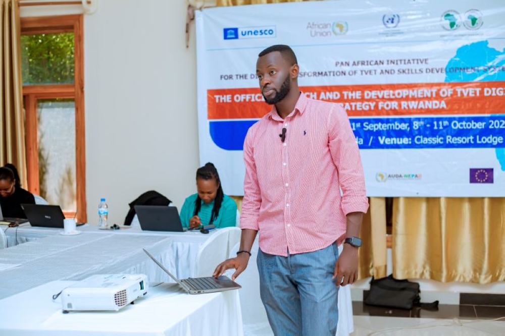 Chance Desire Iradukunda, the founder of Codible Group, a software engineering company during his presentation on the impacr of AI in Rwanda.