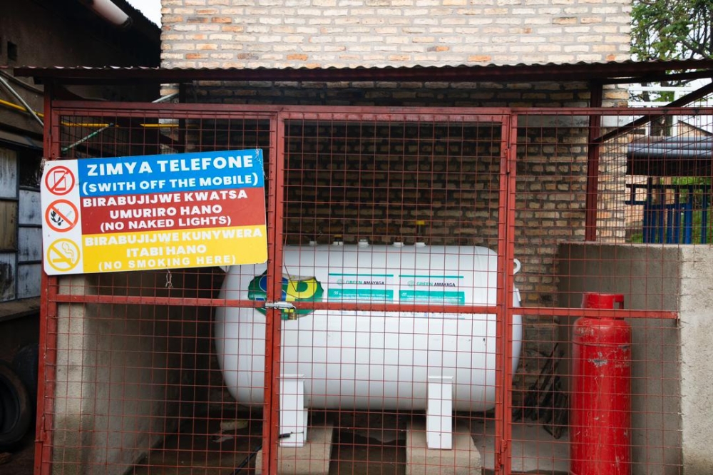 A gas container near the kitchen at Collège Christ-Roi de Nyanza. The use of cooking gas in schools has played a crucial role in protecting forests in the Southern Province. Courtesy