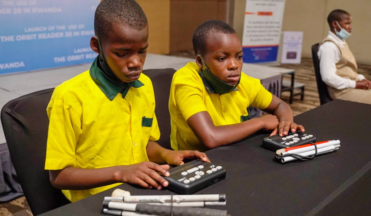 Some children with disabilities during the launch of the use of the Orbit Reader 20 on April 4, 2022. Activists have called upon the government to train more teachers for children with disabilities. Bahizi