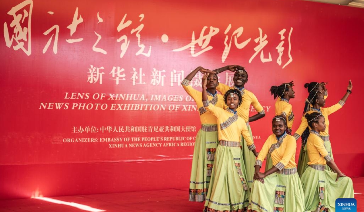 Dancers perform at a news photo exhibition titled "Lens of Xinhua, Images of the Century" in Nairobi, capital of Kenya, Feb. 12, 2025. A news photo exhibition titled "Lens of Xinhua, Images of the Century" kicked off on Wednesday at the Chinese Embassy in Nairobi, Kenya&#039;s capital. (Xinhua/Wang Guansen)