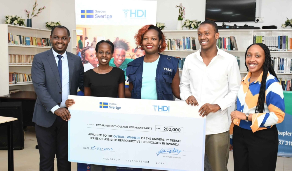 The winning team poses for a photo at the awarding ceremony. 