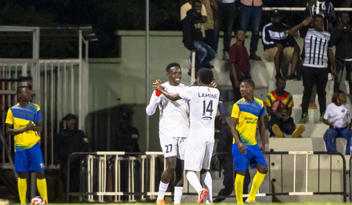 Lamine Bah celebrates with Jean Bosco Ruboneka who scored twice in APR FC’s 4-0 thrashing of Musanze FC at Kigali Pele Stadium on Wednesday, February 19-Courtesy photos