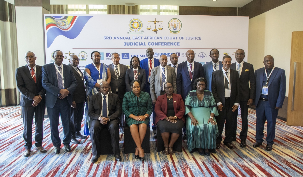 Delegates pose for a group photo at the opening of the Third Annual East African Court of Justice Judicial Conference, in Kigali on February 18. Craish BAHIZI