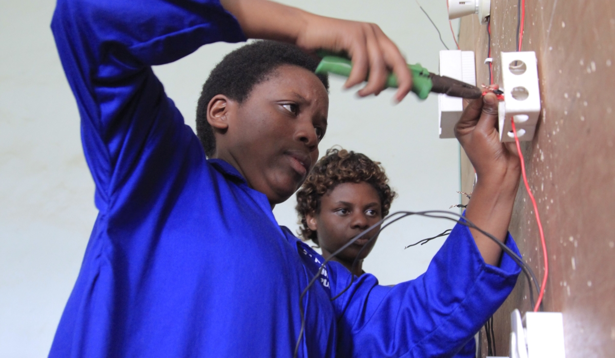 Students during an electrical installation exercise at Musanze Polytechnic. Sam Ngendahimana 