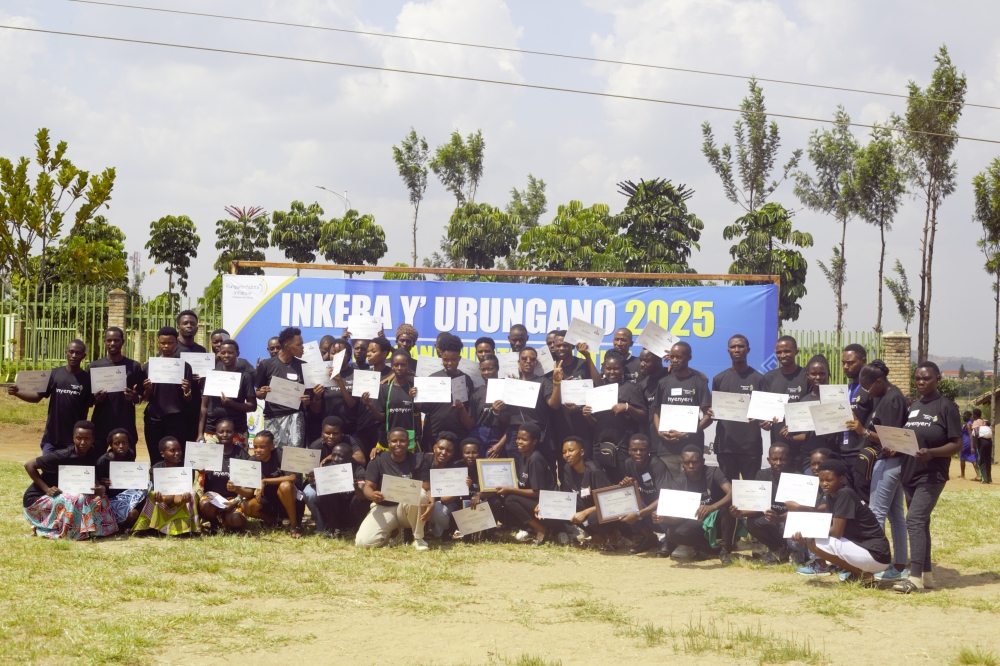 About 70 young people who completed a mentorship programme pose for a group photo at the graduation ceremony in Ruhango District on February 23. Courtesy