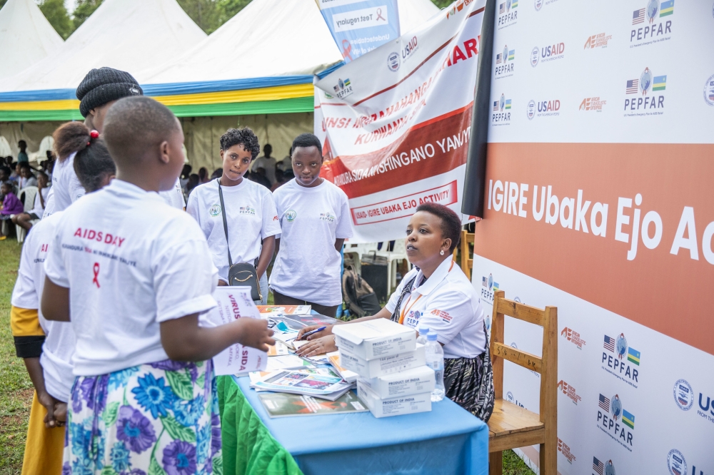 Teen girls follow instructions on contraceptives during the HIV Prevention Campaign by AEE Rwanda  in Gasabo on December 2, 2024. Photos by Emmanuel Dushimimana