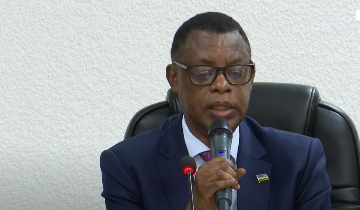 Gen.(Rtd.) James Kabarebe, Minister of State for Regional Cooperation at the Ministry of Foreign Affairs addresses members during a meeting with Rwandan political parties  in Kigali on Tuesday, February 25. Courtesy