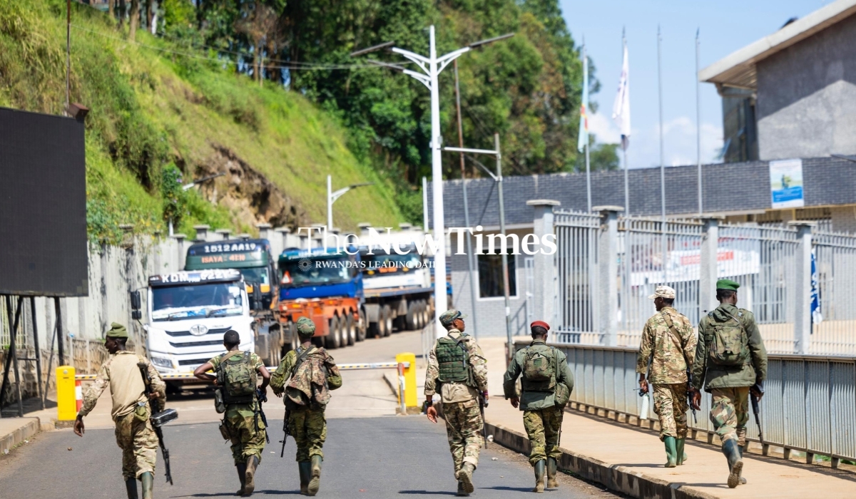 AFCM23 fighters walk back to the DR Congo side of the border soon after their brief show-up at Rusizi 1 Border Post, on Sunday, February 16.