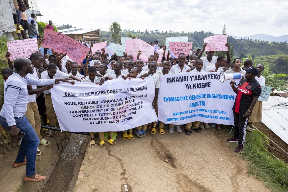 Congolese refugees at Kigeme refugee camp during a peaceful march calling for action on the ongoing killings against Tutsi communities in eastern DR Congo on December 12, 2022. Photo by Willy Mucyo