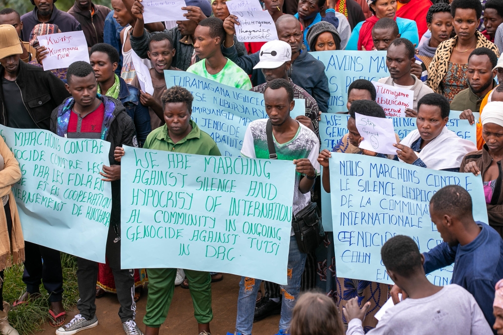Congolese refugees at Kigeme  refugee camp during a peaceful march calling for action on the ongoing killings against Tutsi communities in eastern DR Congo on December 12, 2022. Photo by Willy Mucyo.