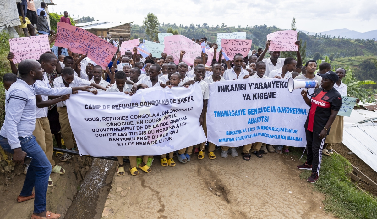 Congolese refugees at Kigeme refugee camp during a peaceful march calling for action on the ongoing killings against Tutsi communities in eastern DR Congo on December 12, 2022. Photo by Willy Mucyo