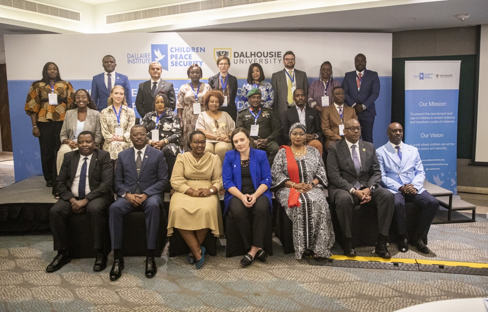 Participants pose for a group photo at a conference organised by the Dallaire Institute for Children, Peace, and Security’s African Centre of Excellence, Kigali,  from February 19 to 20. Dan Gatsinzi