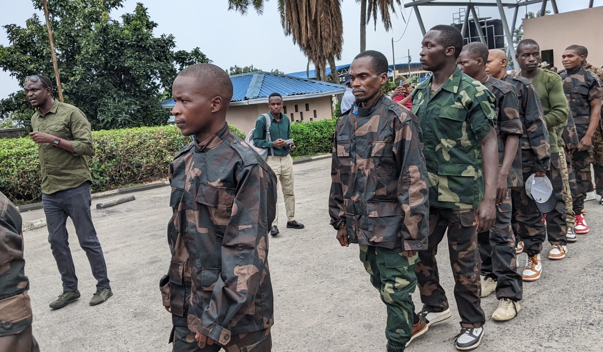 Some FDLR genocidal group memberes captured by M23 at the handover event in Rubavu District on Saturday, March 1. Photo by Germain Nsanzimana