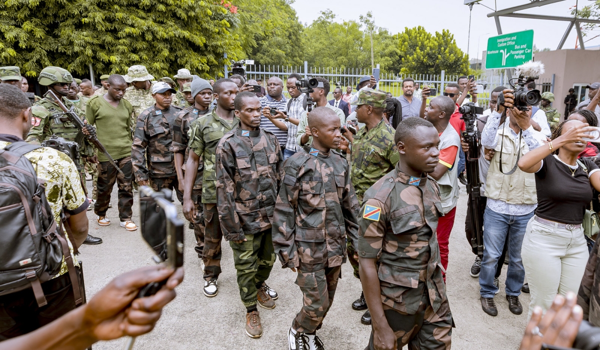 Some FDLR terrorists and génocidaires being handed over to Rwandan authorities last Saturday. PHOTO BY IGIHE