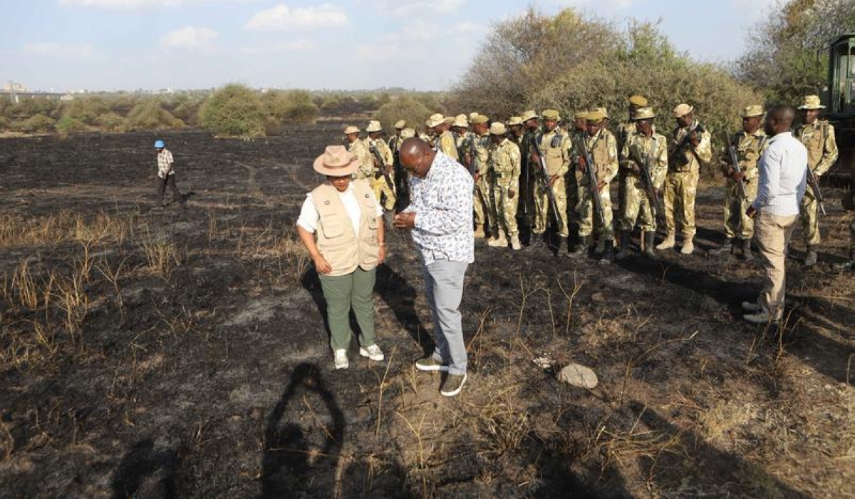 Rebecca Miano (L, Front), Cabinet Secretary for Tourism and Wildlife, and other officials visit a section ravaged by fire at the Nairobi National Park in the capital of Kenya, March 1, 2025. (Photo by Joy Nabukewa/Xinhua)